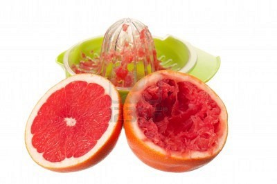 11633855-glass-of-fresh-grapefruit-juice-juicer-and-grapefruit-fruits-on-white-background.jpeg